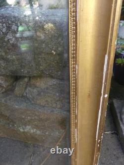 Frame from the Restoration period with original XIX century glass and original gilding.