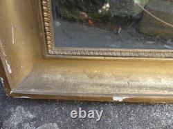 Frame from the Restoration period with original XIX century glass and original gilding.