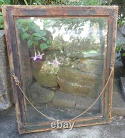 Frame from the Restoration period with original XIX century glass and original gilding.