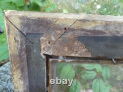 Frame from the Restoration period with original XIX century glass and original gilding.