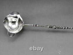 Ladle for punch or cream in solid silver and bone, 19th century