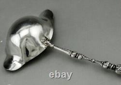 Ladle for punch or cream in solid silver and bone, 19th century