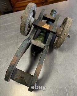 Large model of a cast iron cannon, wood and repoussé metal, late 19th century