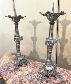 Large pair of silvered bronze candlesticks, 19th century.