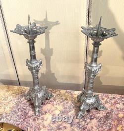 Large pair of silvered bronze candlesticks, 19th century.