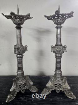 Large pair of silvered bronze candlesticks, 19th century.
