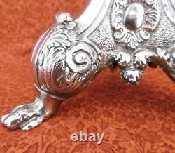 Large silver-plated candleholder with candle snuffer, stamped from the 19th century. H. 37.5 cm