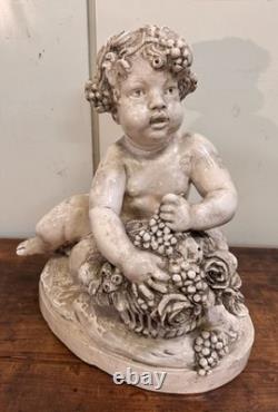 Lebrun glazed terracotta putti, late 19th century