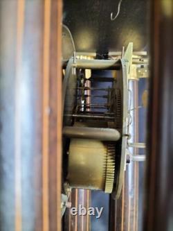 Light wood and gilded bronze pendulum clock / Restoration period / 19th century Light wood and gilded bronze pendulum clock / Restoration period / 19th century