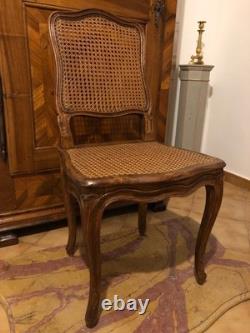 Louis XV Caned Chair in Carved Beech. France, 18th Century