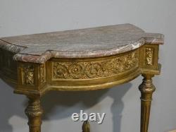 Louis XVI-style half-moon console in gilded wood and marble, 19th century