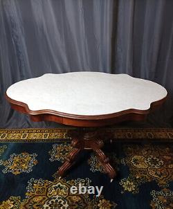 Mahogany and marble table from the 19th century