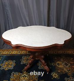 Mahogany and marble table from the 19th century