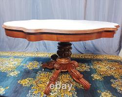 Mahogany and marble table from the 19th century