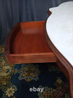 Mahogany and marble table from the 19th century