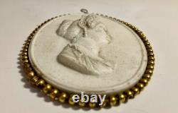 Medallion in biscuit. Poppea wife of Nero. Antique bust. 19th century.
