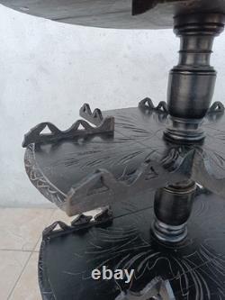 Napoleon III period blackened wood guéridon with foliage decoration