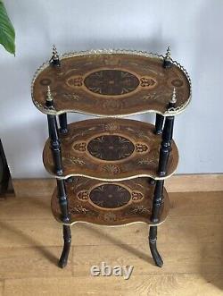 Napoleon III period shelf with marquetry trays, gallery, and brass decorations