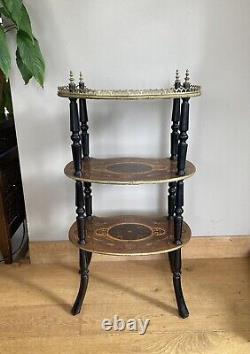 Napoleon III period shelf with marquetry trays, gallery, and brass decorations