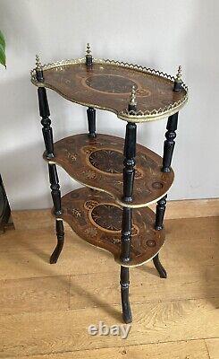 Napoleon III period shelf with marquetry trays, gallery, and brass decorations