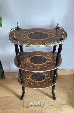 Napoleon III period shelf with marquetry trays, gallery, and brass decorations