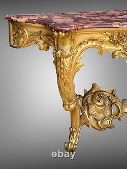 Nineteenth-century gilded and carved wooden console table with a veined red marble top