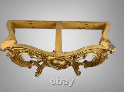 Nineteenth-century gilded and carved wooden console table with a veined red marble top