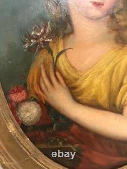 Oil painting on panel of a young woman with flowers, 19th century.