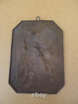 Old bronze plaque statue sculpture of Marianne from the 19th century for the Town Hall