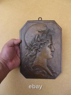 Old bronze plaque statue sculpture of Marianne from the 19th century for the Town Hall
