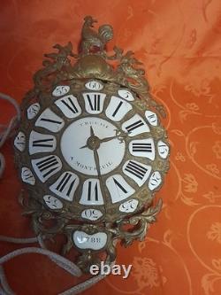 Old pendulum movement of a Comtoise clock with rooster from the 18th century dated 1788