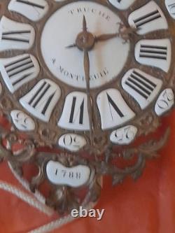 Old pendulum movement of a Comtoise clock with rooster from the 18th century dated 1788