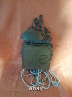 Old pendulum movement of a Comtoise clock with rooster from the 18th century dated 1788