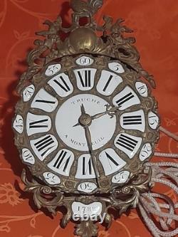 Old pendulum movement of a Comtoise clock with rooster from the 18th century dated 1788