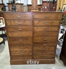 Old tradesman’s chest of drawers in solid oak, 19th century