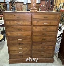Old tradesman’s chest of drawers in solid oak, 19th century