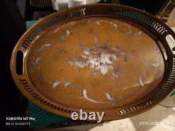 Oval plate in painted metal with floral decoration on ochre background, 19th century, size 3