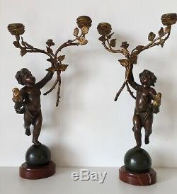 Pair Of Candlesticks In Bronze On A Marble Base Period Of The Nineteenth Century