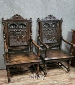 Pair of Breton armchairs in carved wood, 19th century