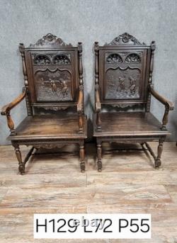 Pair of Breton armchairs in carved wood, 19th century