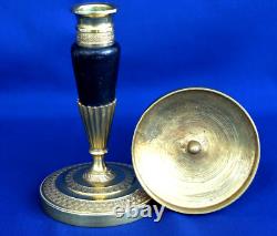 Pair of Empire-era candlesticks for the toilet table, gilt and patinated bronze, 19th century