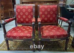 Pair of Empire-period mahogany armchairs with Napoleonic emblems, 19th century
