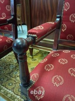 Pair of Empire-period mahogany armchairs with Napoleonic emblems, 19th century