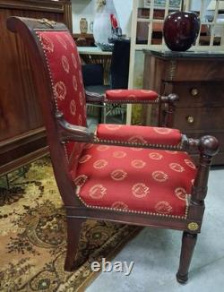 Pair of Empire-period mahogany armchairs with Napoleonic emblems, 19th century