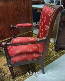 Pair of Empire-period mahogany armchairs with Napoleonic emblems, 19th century
