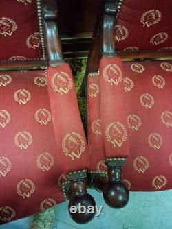 Pair of Empire-period mahogany armchairs with Napoleonic emblems, 19th century