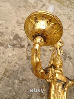 Pair of Louis XVI period sconces. Gilded bronze. Late 18th century, early 19th century.