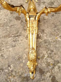 Pair of Louis XVI period sconces. Gilded bronze. Late 18th century, early 19th century.