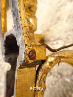 Pair of Louis XVI period sconces. Gilded bronze. Late 18th century, early 19th century.