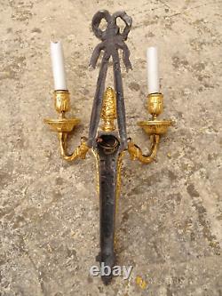 Pair of Louis XVI period wall lights. Gilt bronze. Sconces. Late 18th century, early 19th century.